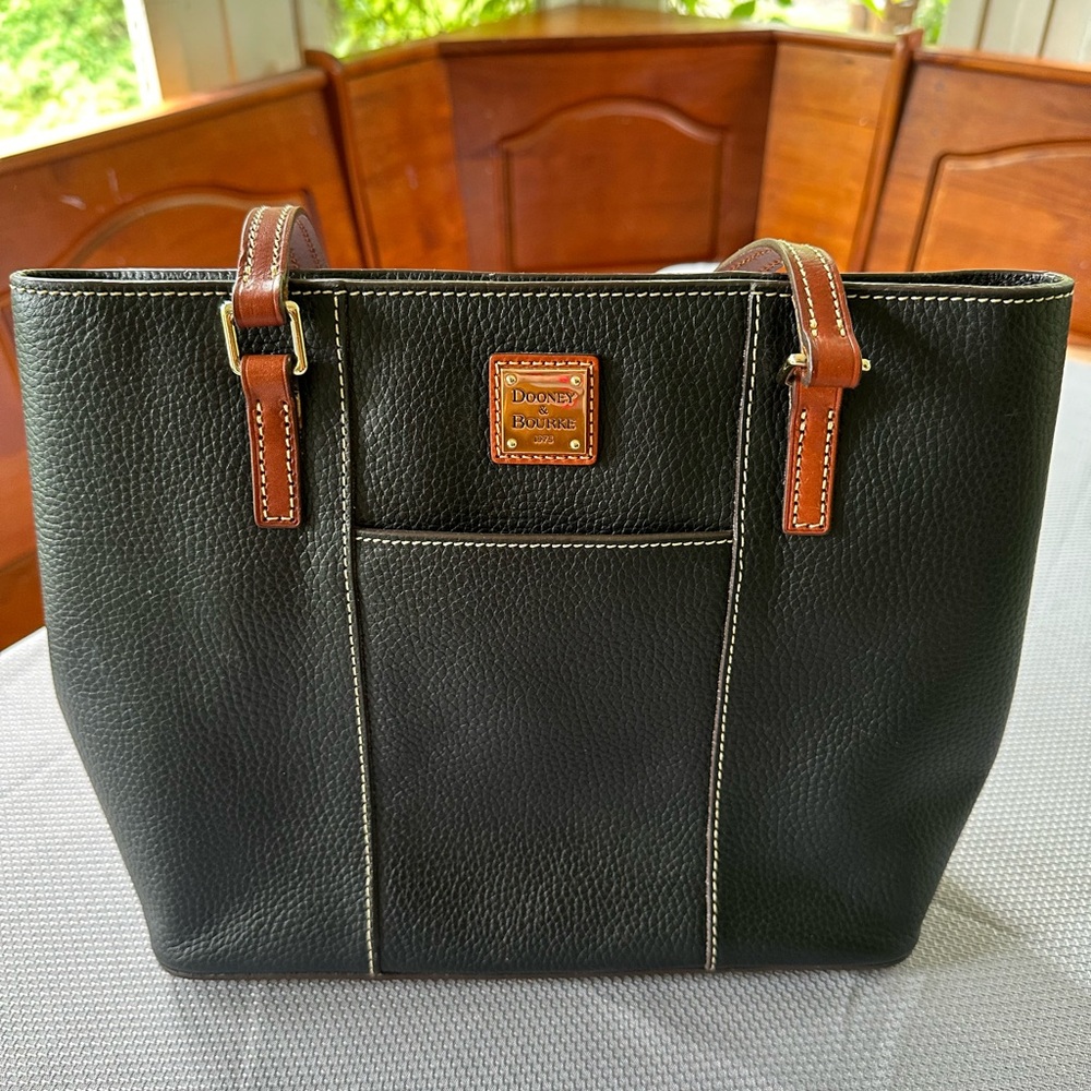 EUC - Dooney & Bourke Black purse with brown straps. Red inside.